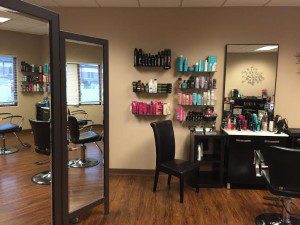 A hair salon with many items on the wall.